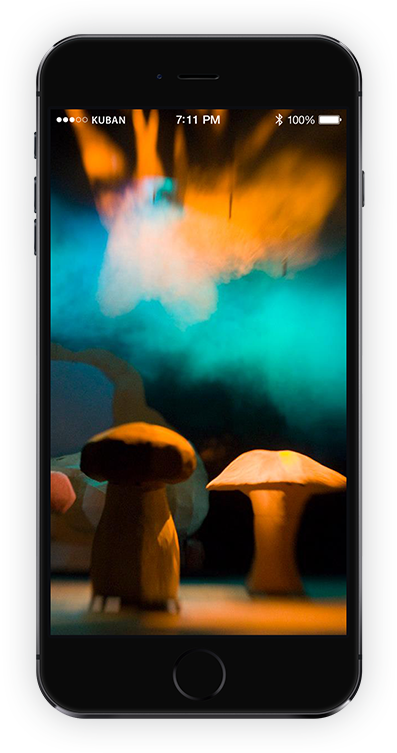 iphone with some mushrooms, performing on a stage